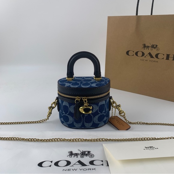 Coach Handbags - COACH Blue Denim Signature Mini Vanity Crossbody